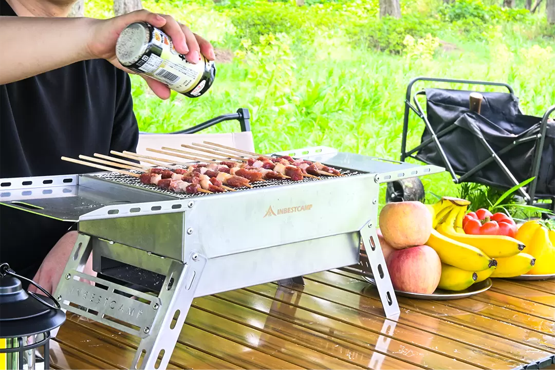 Barbecue au charbon de bois en acier inoxydable avec poignée pliable