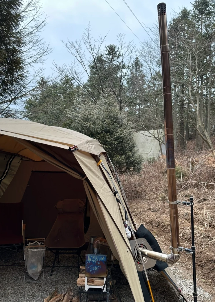 Comment installer un conduit de fumée sur un poêle de tente en toile