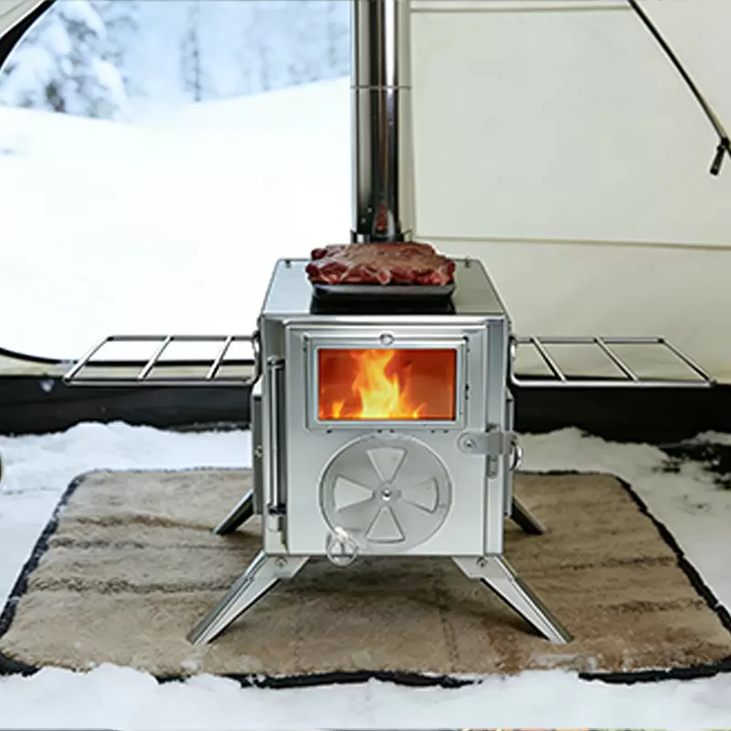 Po&ecirc;le &agrave; bois portable pour le camping