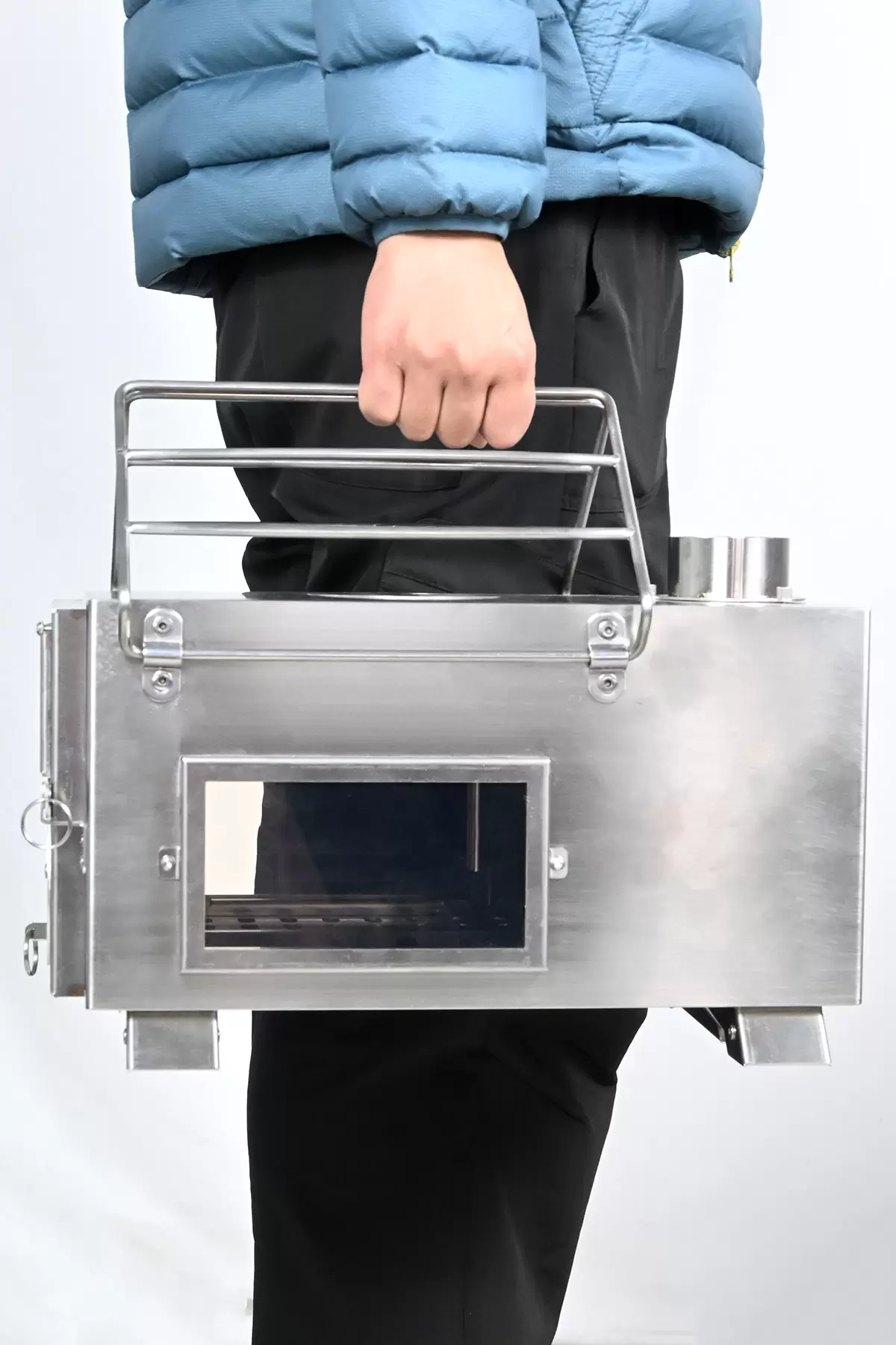 Po&ecirc;le &agrave; bois portable pour le camping